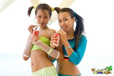 Two tiny Asians upskirt plus flash their cute compendious boobies
